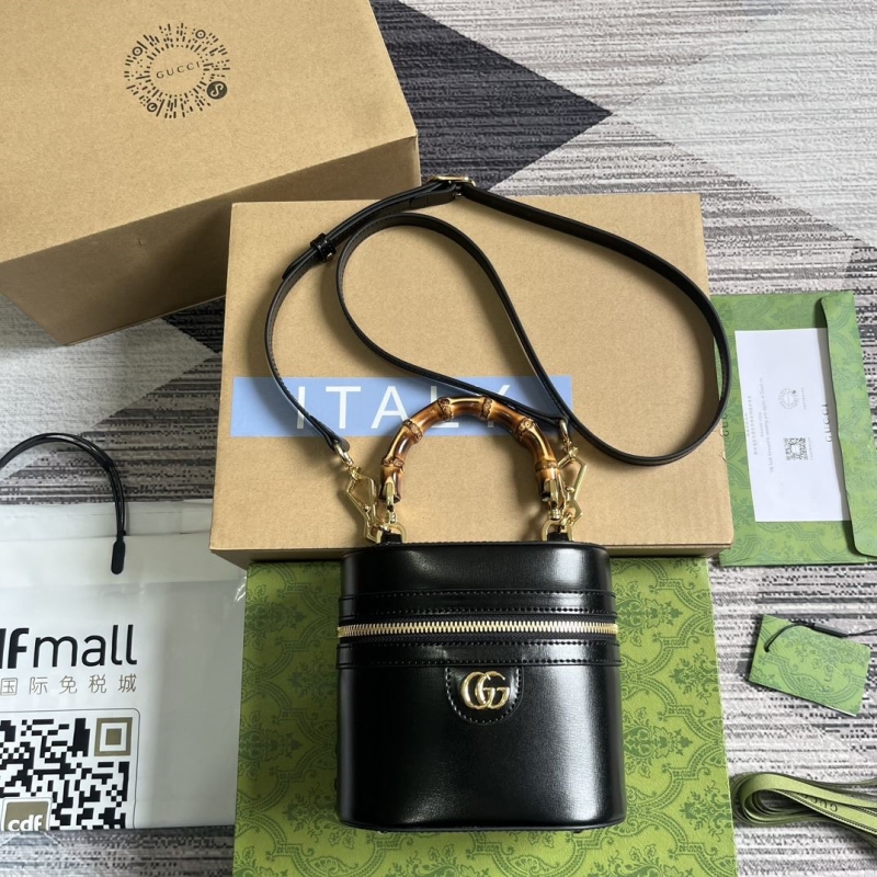 G*u*i cosmetic bags